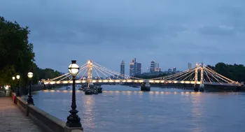 London Albert Bridge at evening from Victoria Embankment.jpg